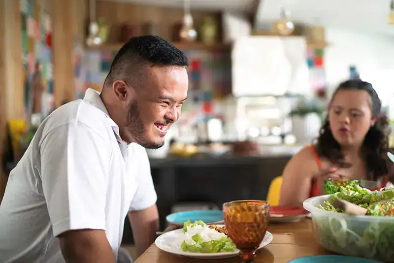 Empowering Weight Loss: A Comprehensive Guide for Individuals with Disabilities 2 Image of a disabled man and balance around nutrition to aid weight loss Dover