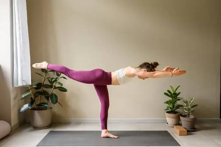Achieving the Perfect Tone: How Often Should You Exercise for Results? 1 Woman doing Yoga exercise Dover to help with toning the body.