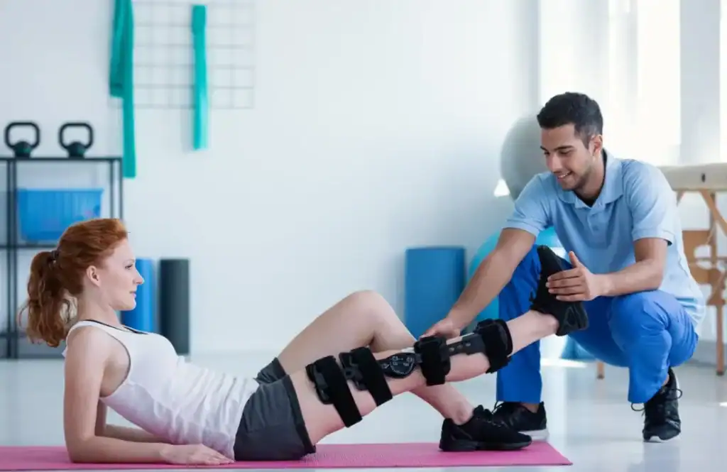 Woman having treatment to help muscle recovery Dover after an injury