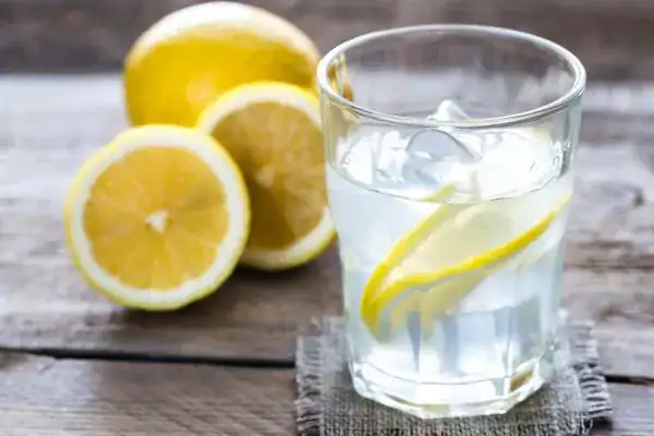 Hydration: The Secret Ingredient for a Toned Stomach and Enhanced Fitness 2 Image of lemon water to aid hydration Dover